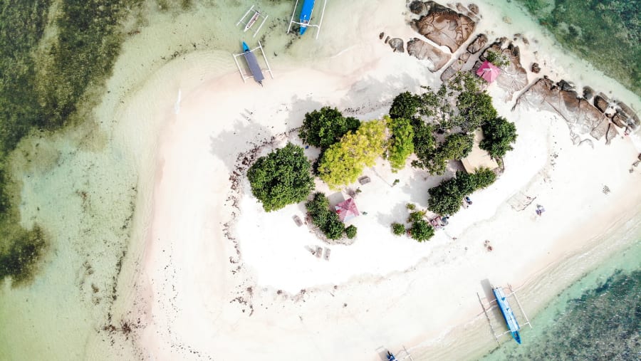 Board a boat ride to the beautiful Gili islands