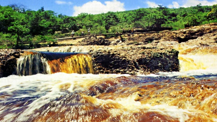 Admire the Little Waterfall in Serrano