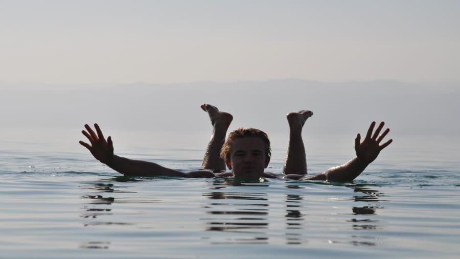 A man floating in the Dead Sea