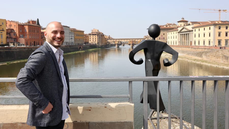 Common Man Statue by Clet Abraham Ponte Alle Grazie Florence Italy