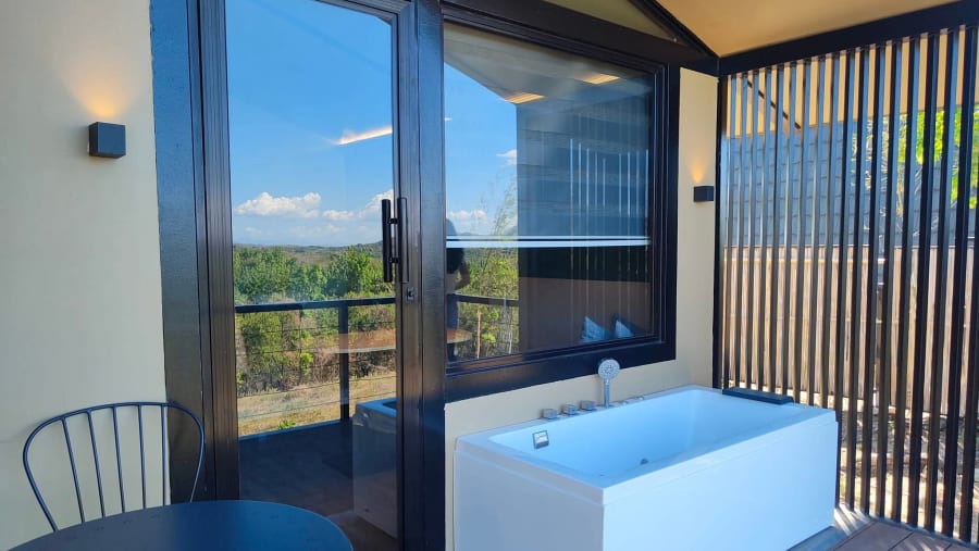 Scenic soaks from your own mountain-view balcony