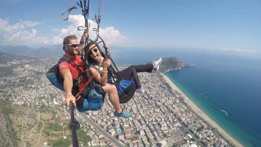 Travellers paragliding in Tandem