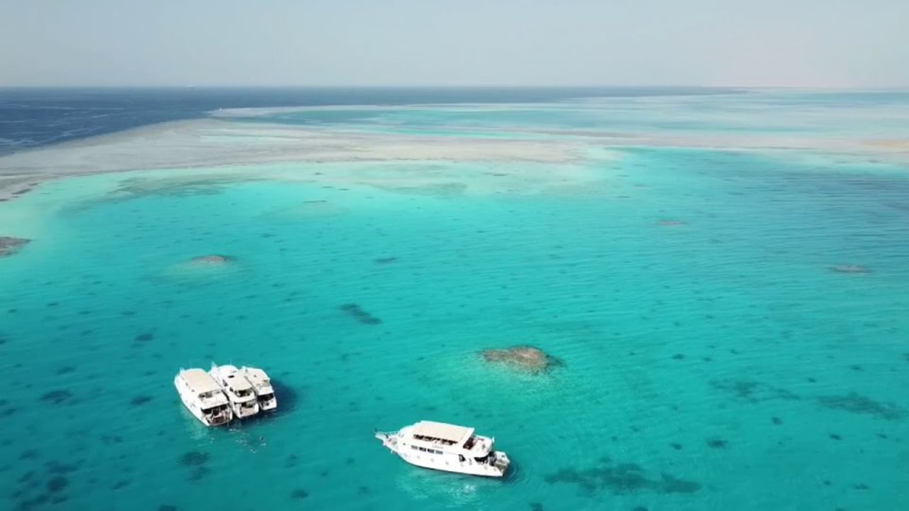 Paradise Island sandy beach, Giftun Island National Park coast, Hurghada pier, Red Sea snorkel sites