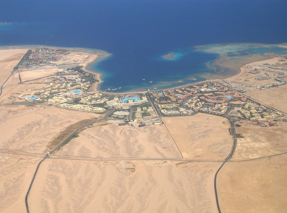 Sharm El-Naga Bay coral reefs, sandy beach, Red Sea waters
