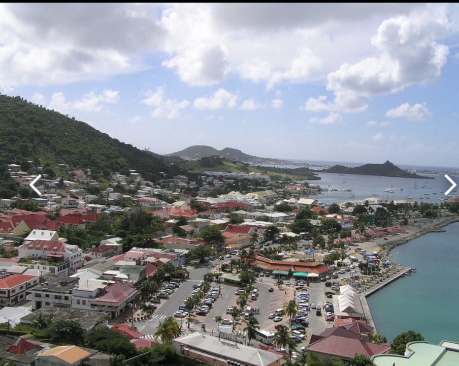 Grand Case white-sand beach, Marigot marketplace, Fort Louis hilltop