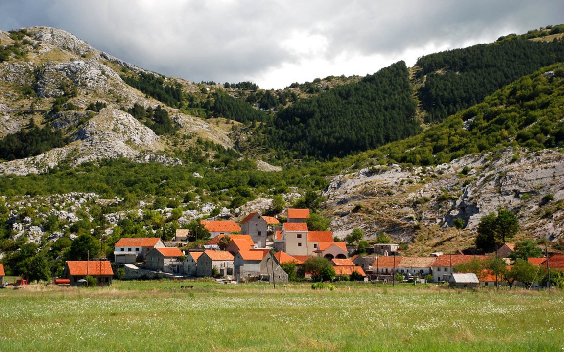 Budva sandy beaches, Cetinje royal capital streets, Njeguši village smoked ham and cheese, Boka Bay from 800 m