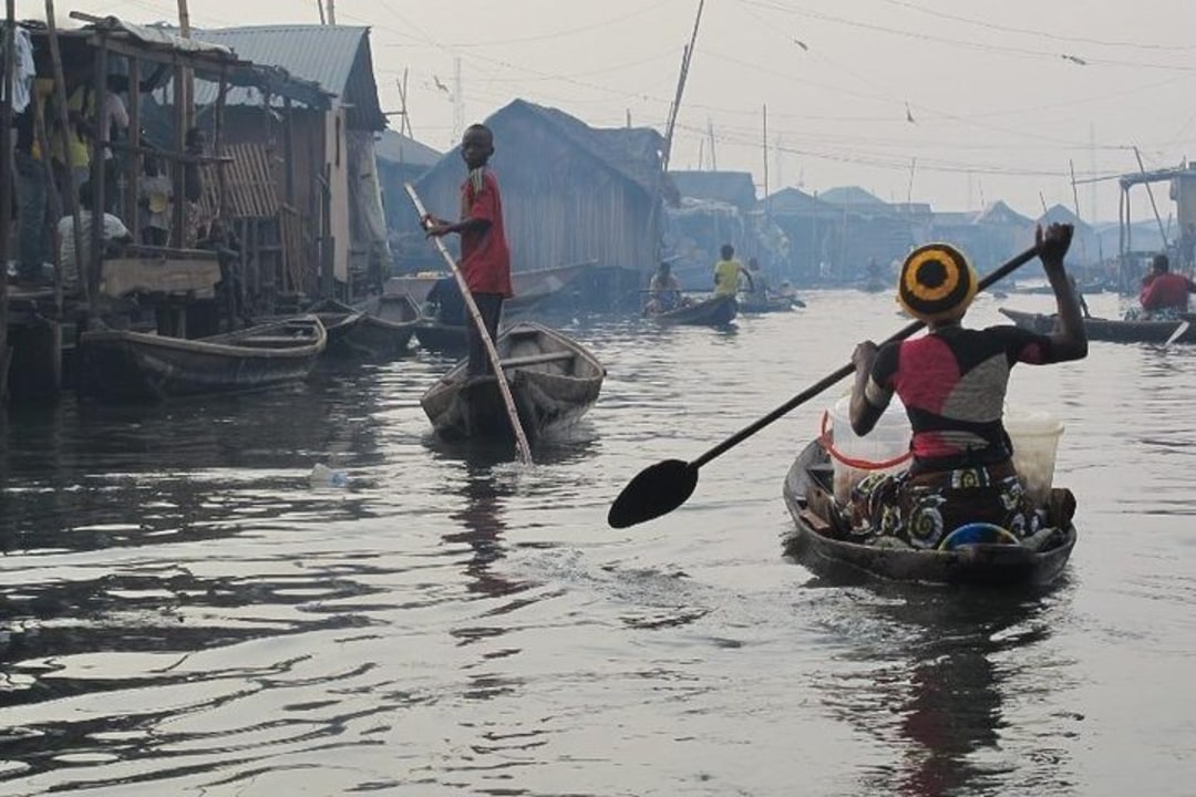 Makoko's watery streets, stilt houses, Baale's house