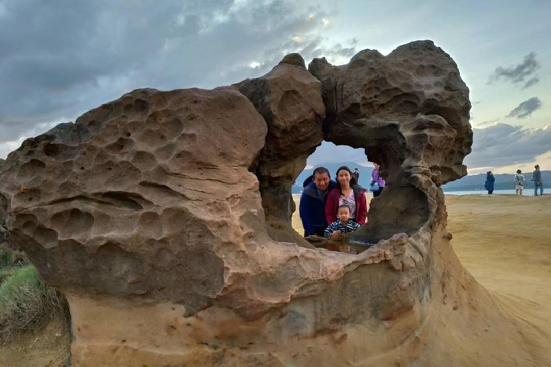 Yehliu Geopark honeycomb rocks, Laomei Green Reef seasonal green reef, Jiufen Old Street teahouses, Shifen Old Street railway tracks