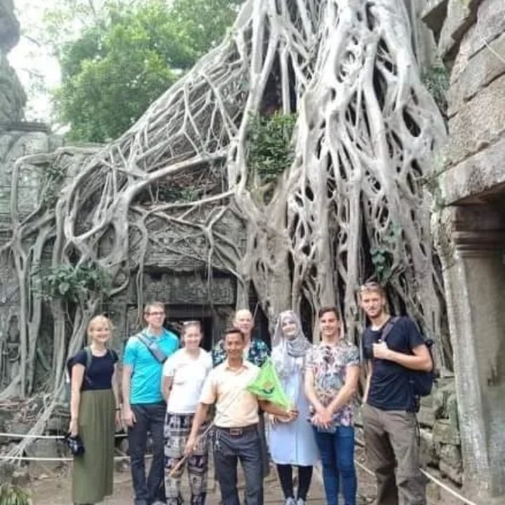Angkor Wat at sunrise, Ta Prohm temple, Old City Gate, Bayon Temple faces