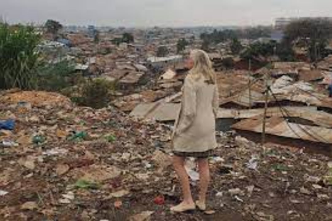 Kibera Slum, Prestige Plaza on Ngong Road, colonial-built railway lines, the many football pitches