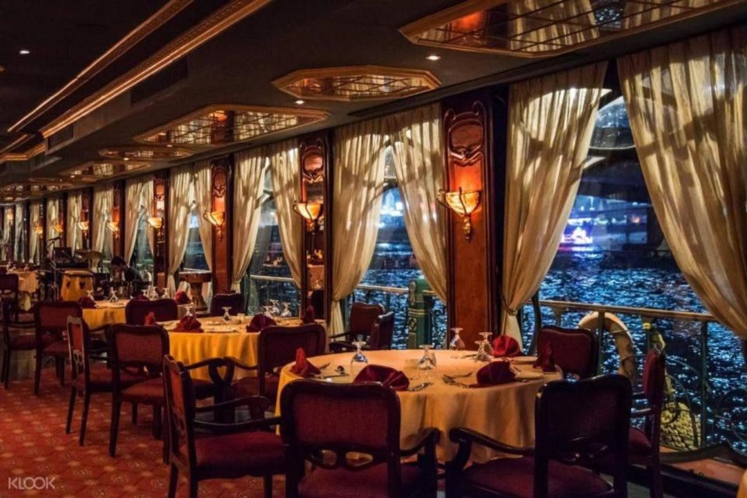 Nile, floating or 5-star restaurant, Cairo skyline