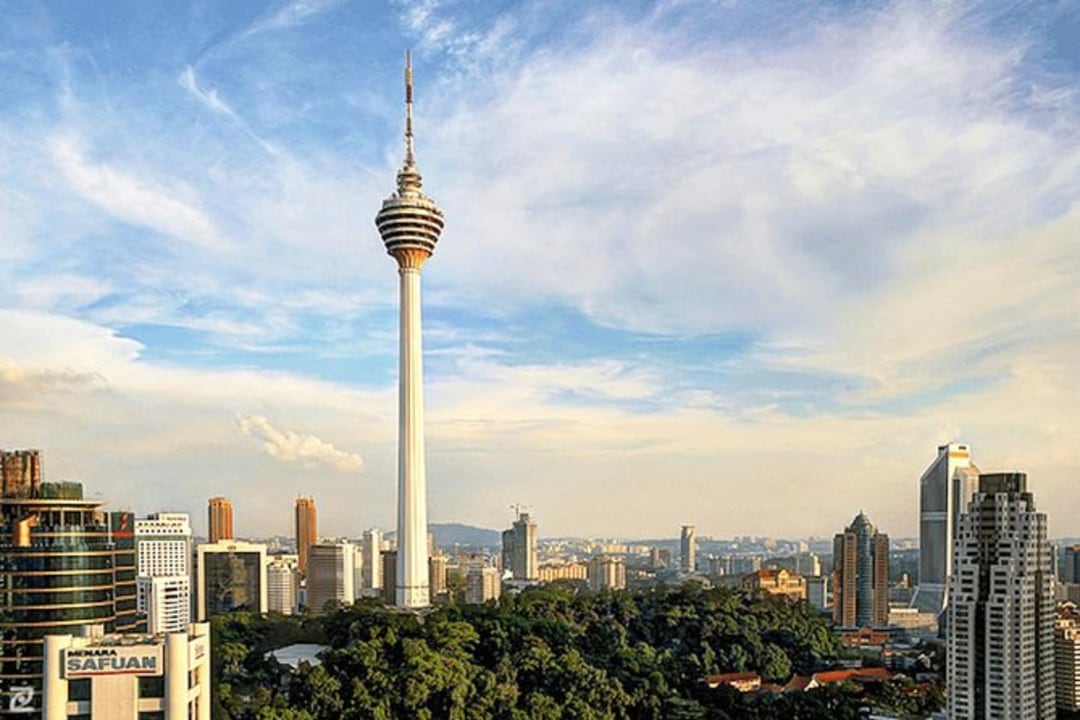 Batu Caves at sunrise, Merdeka Square landmarks, Central Market stalls, Kuala Lumpur Tower observation deck