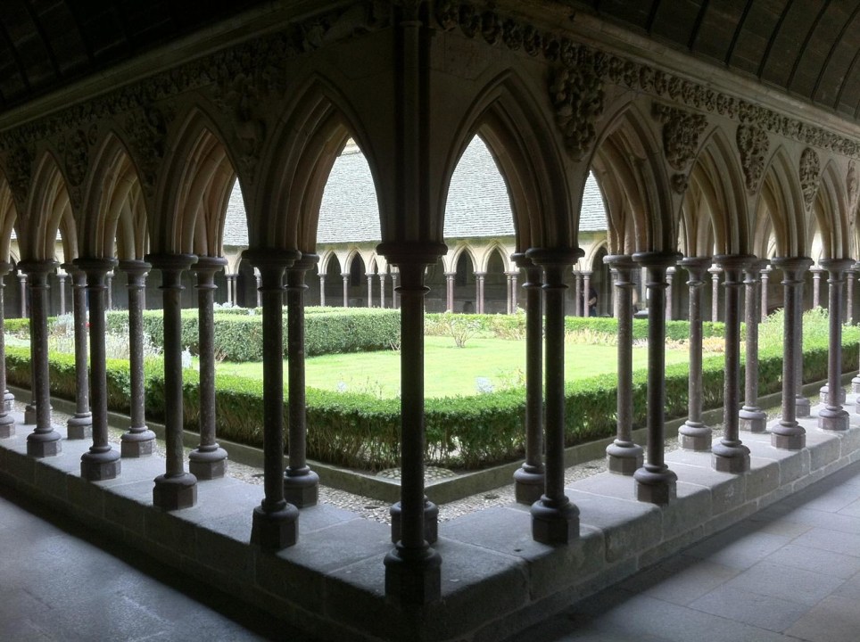 Mont Saint-Michel, Benedictine Abbey and Gothic spires, cobblestone streets and tidal waters