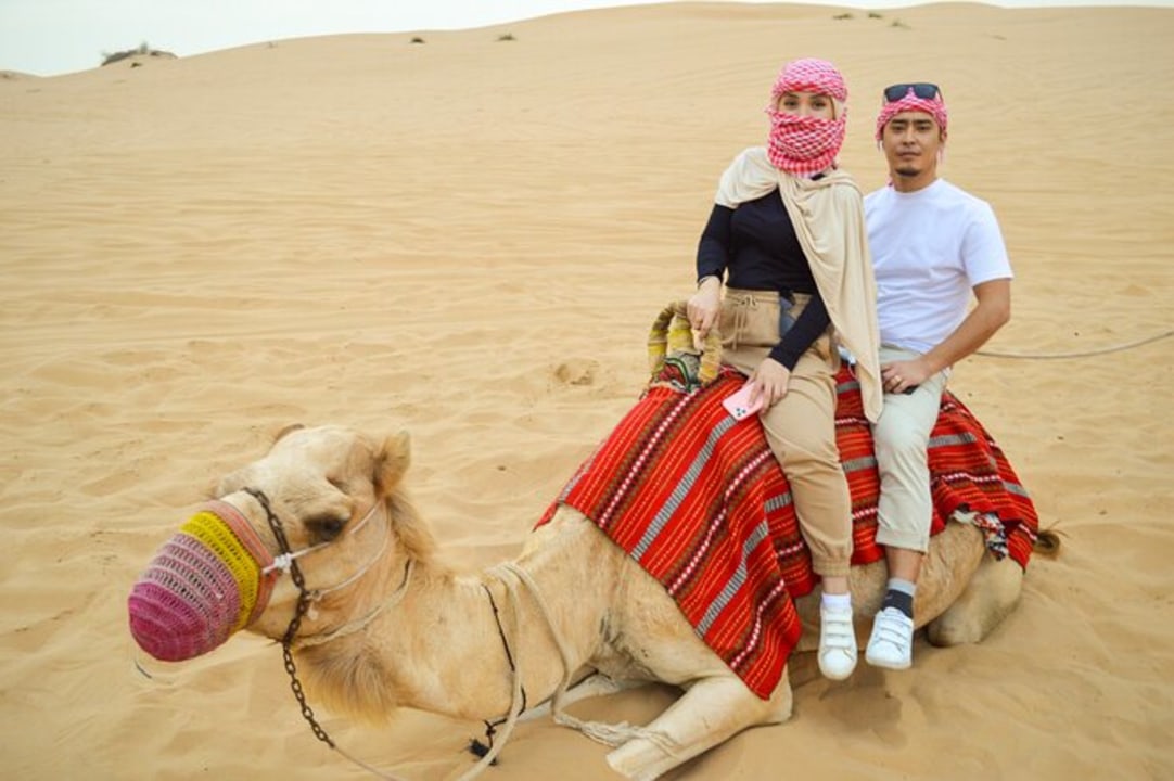 Arabian Desert, golden dunes, breathtaking desert sunset, traditional desert camp