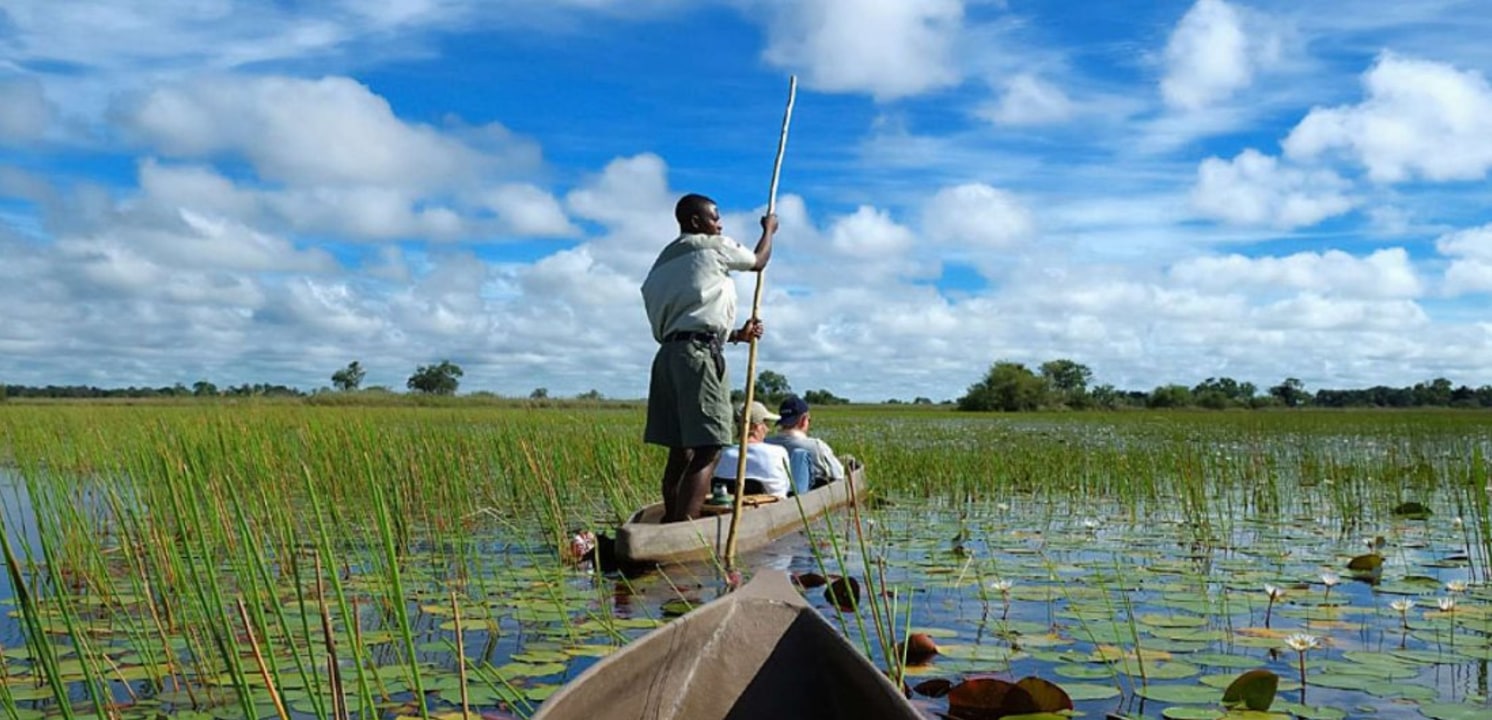Okavango Delta waterways, Audi Camp riverside, mokoro journeys, campfire storytelling
