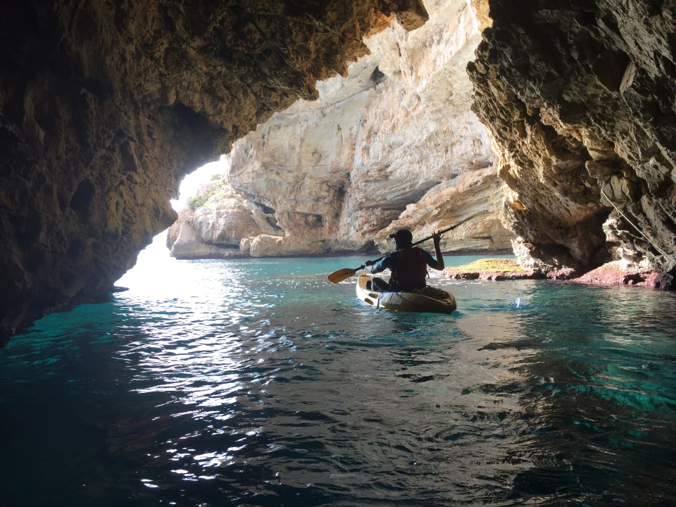 Dénia's Pirate Cave, natural swimming pool at the cave's mouth, the beach