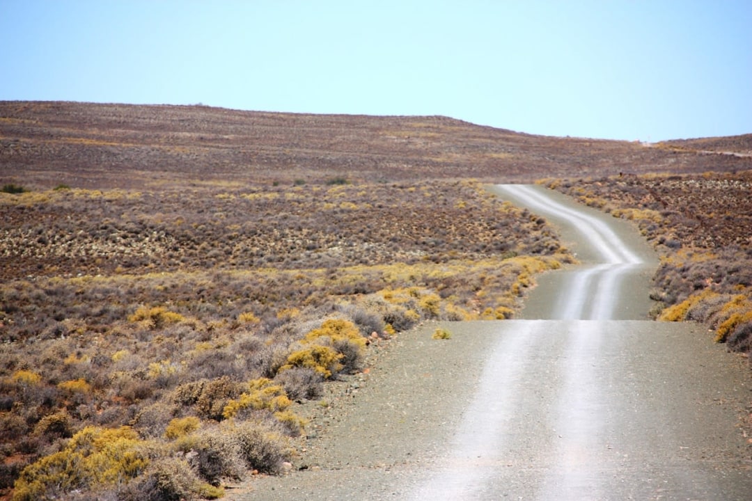 Sea Point geological contact zone, Swartberg Pass folded rock formations, Karoo National Park fossil trail, Meiringspoort over-thrust fault