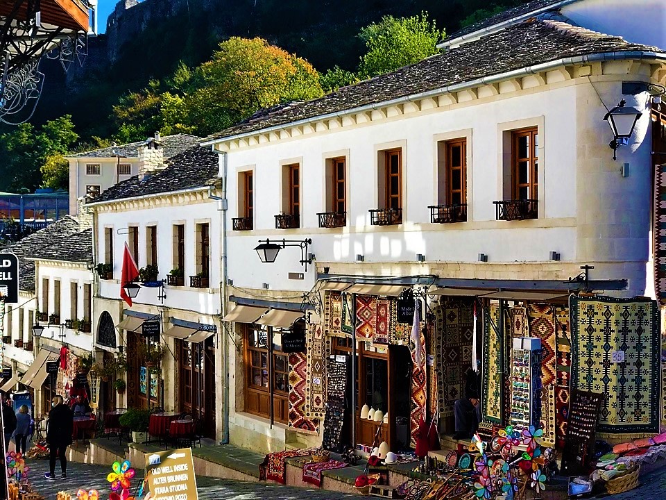 Butrint peninsula, Llogara National Park coastal ridge, Berat Castle hilltop houses, Sveti Stefan celebrity island