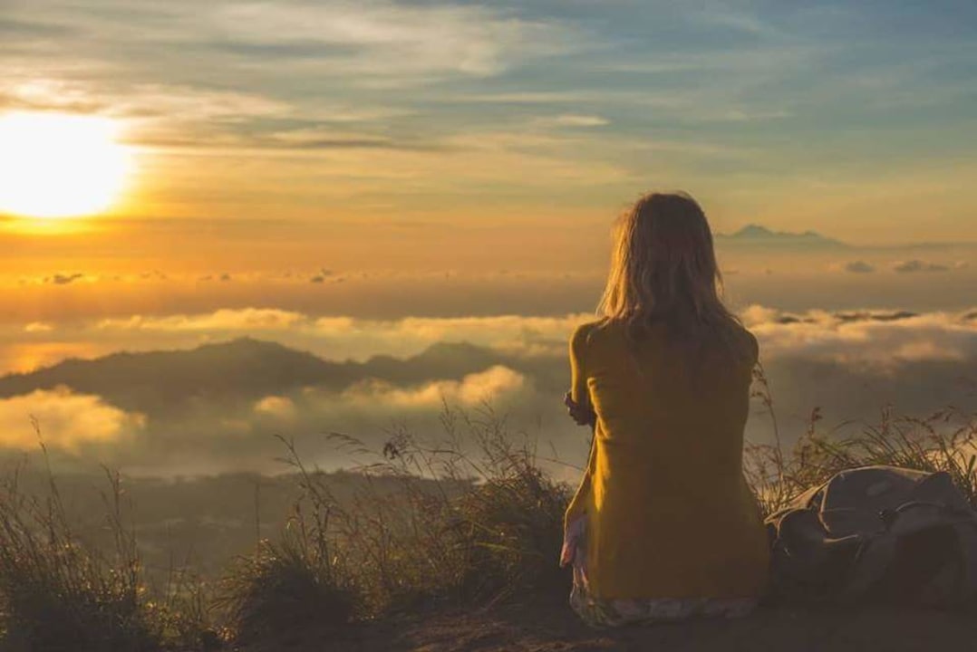 Mount Batur at sunrise, volcanic valley, Toya Devasya hot springs