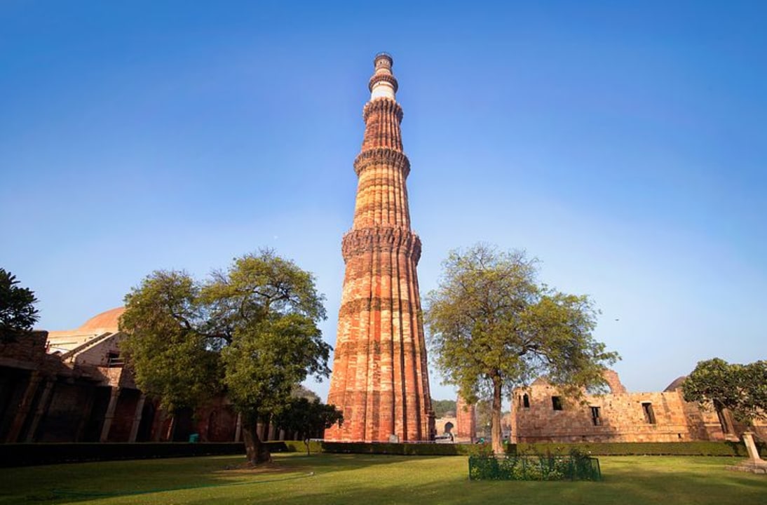 Jama Masjid courtyard, rickshaw lanes of Chandni Chowk, Humayun's Tomb gardens, Qutub Minar tower