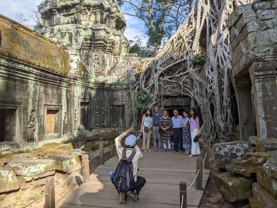 Angkor Wat, Bayon smiling faces, Ta Prohm jungle-entwined ruins