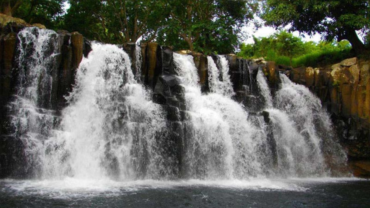 Trou D'Eau Douce, Grand River South East waterfall, Ile Aux Cerfs, white sandy beaches