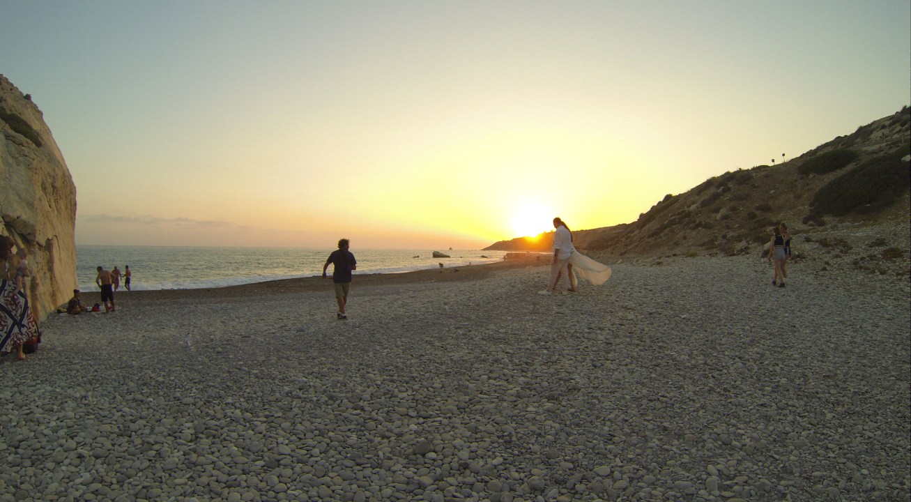 Mandria Village beach, Aphrodite's Rock, coastline views at sunset