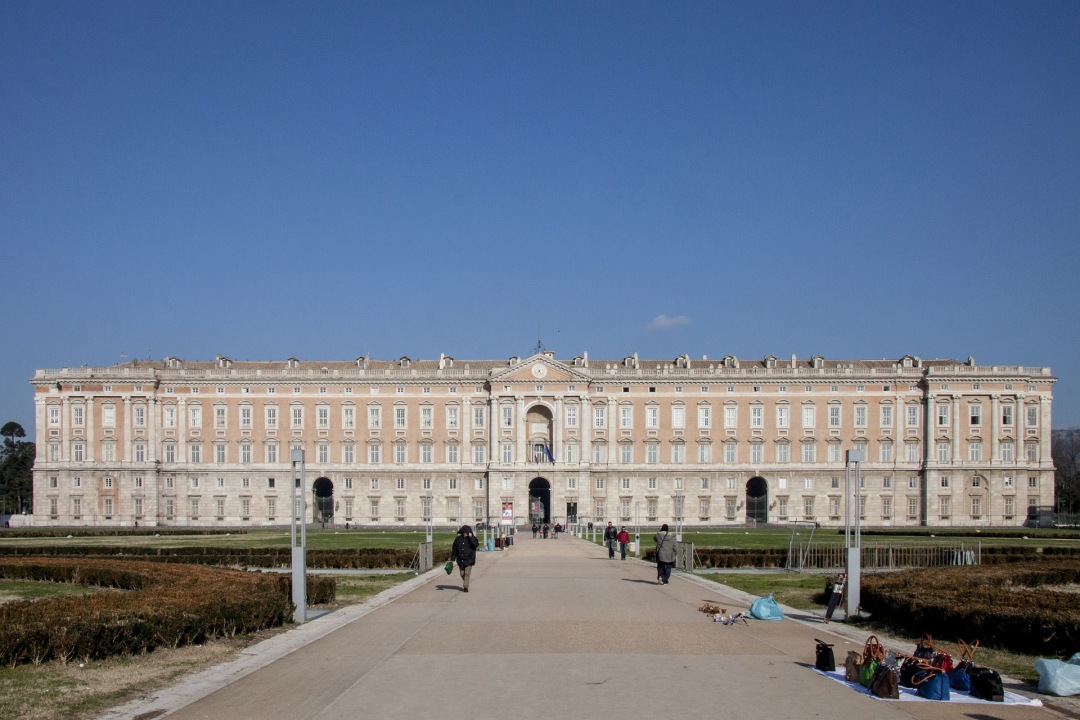 Royal Palace of Caserta, the majestic staircase with 116 steps and marble statues, Palatine Chapel with vaulted ceilings and gilded rosettes, royal apartments