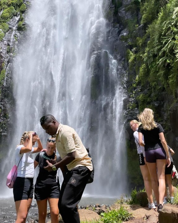 Marangu Waterfalls, tropical rainforest, glacier of Kilimanjaro