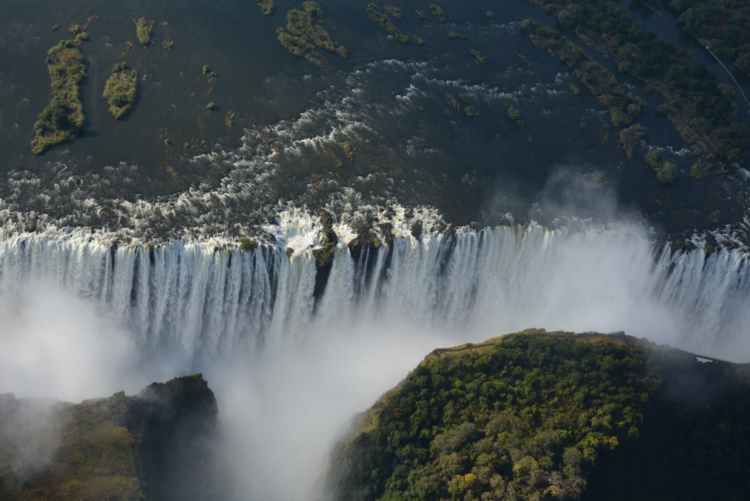 Sossusvlei dunes, Deadvlei salt pans, Okavango Delta waterways, Victoria Falls