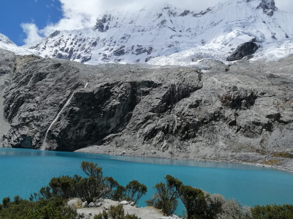 Lake 69, waterfall in the valley beneath Pisco and Chacraraju Mountain, Chinancocha and Orconcocha