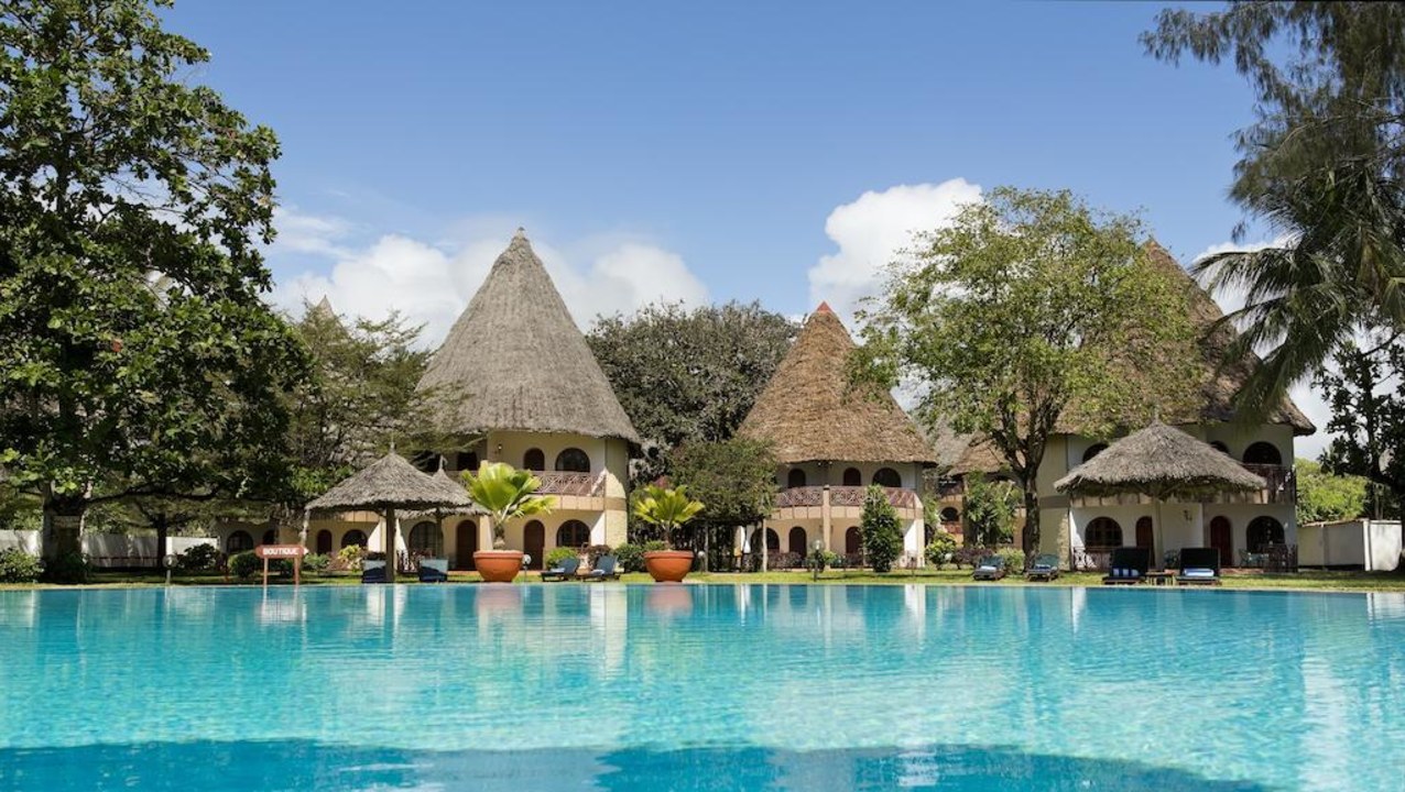 Neptune Paradise Beach Resort, Diani Beach, tropical garden, pool lounges