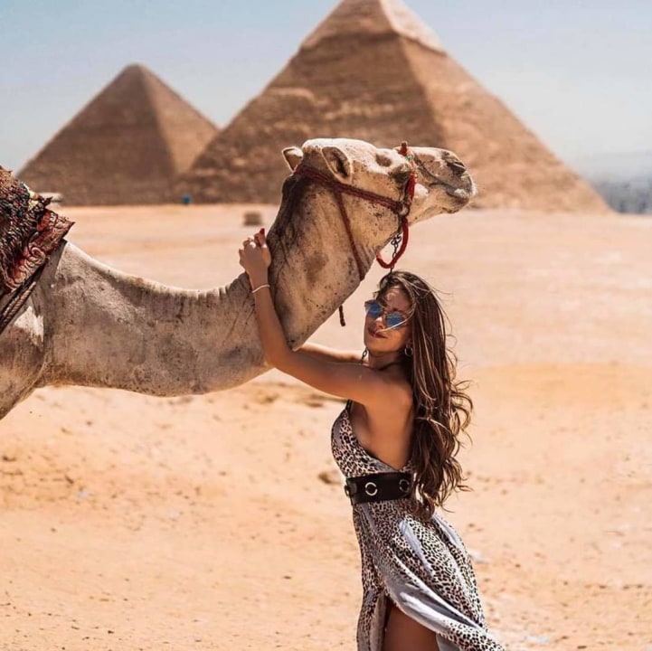 camel-dotted Giza Plateau, Great Pyramid of Giza, Great Sphinx of Giza, Valley Temple