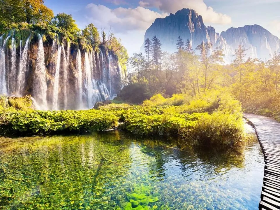 Plitvice Lakes National Park, wooden pathways and bridges, cascading waterfalls, crystal-clear turquoise lakes