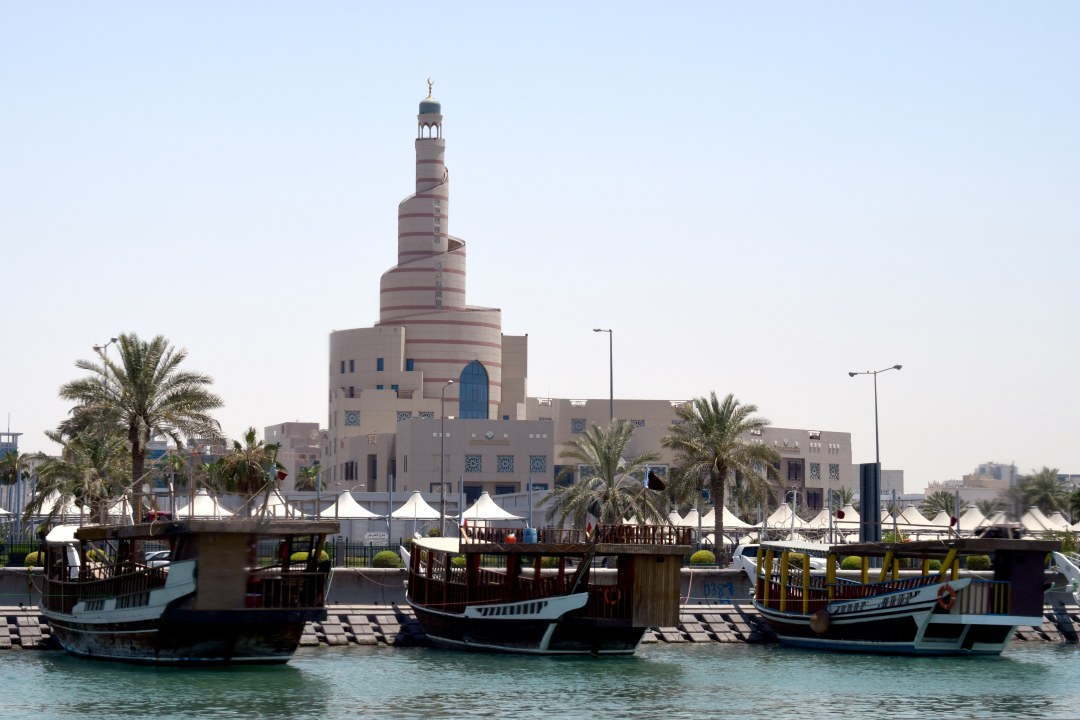 Corniche waterfront, Souq Waqif alleys, West Bay skyline