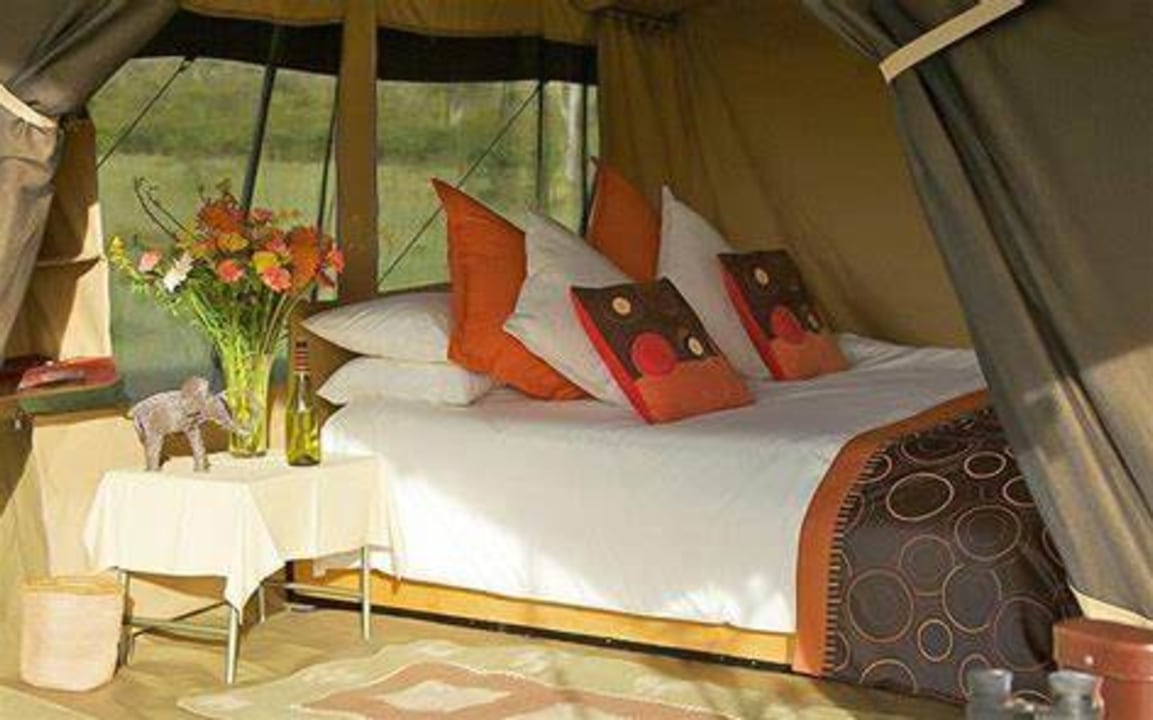 Masai Mara plains, Lake Nakuru National Park flamingo shores, Lake Naivasha waters, Great Rift Valley escarpment