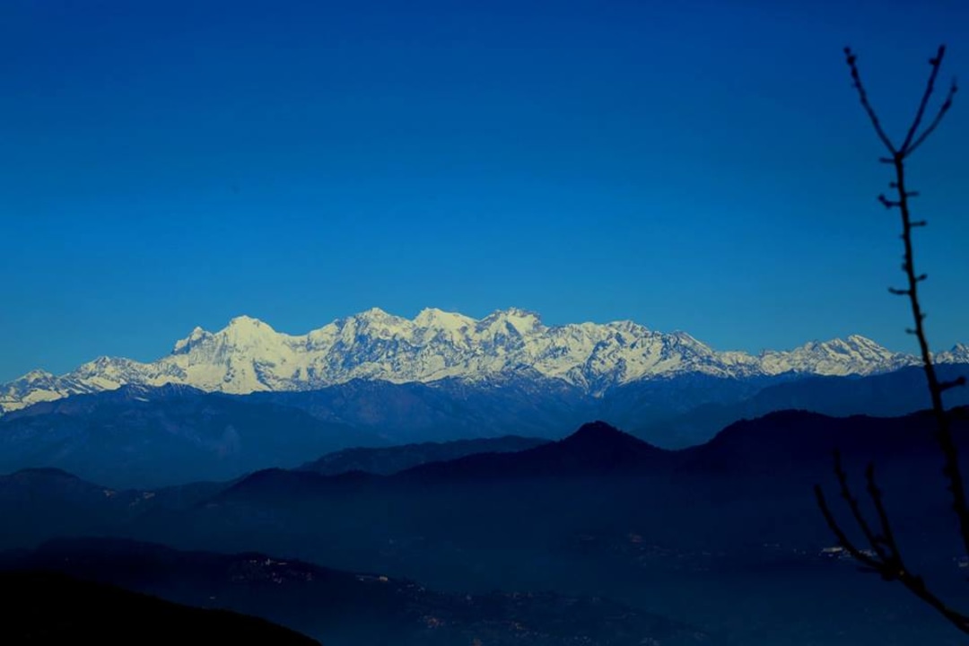 Champa Devi pilgrimage site, forested Pharping hills, Langtang and Gauri Shanker ranges
