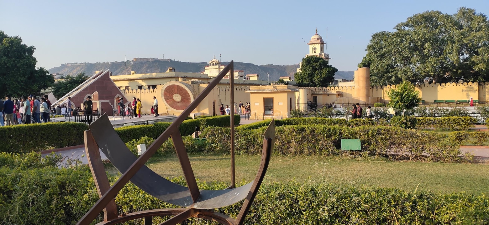 City Palace courtyards, Jantar Mantar instruments, Hawa Mahal honeycomb facade, Pink City bazaars