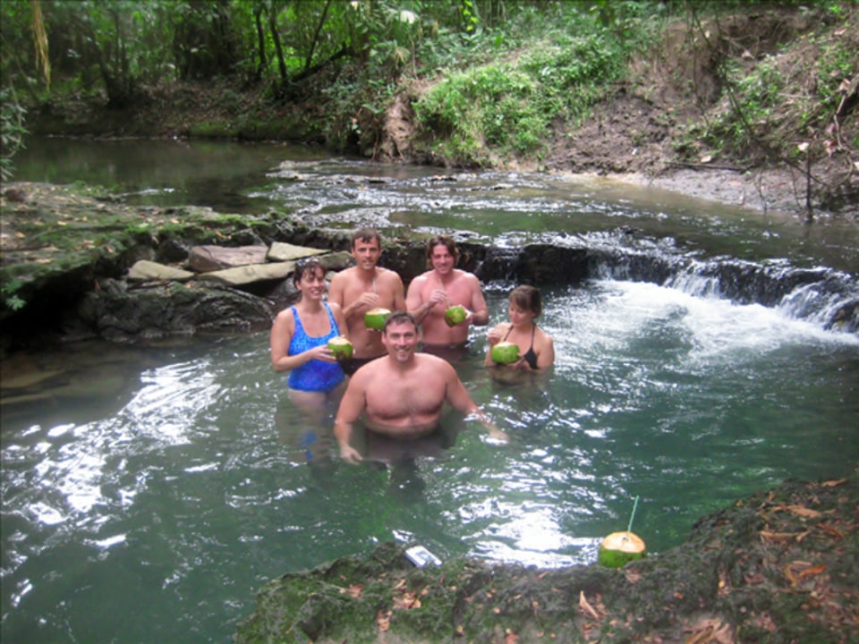 Rio Grande River, lush jungle scenery, stalagmites and stalactites, the only hot spring in Belize