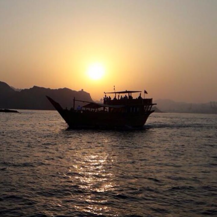 Muscat's spectacular golden mountains, Sea of Oman, old Muscat