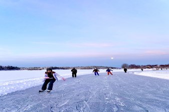 Ice-skating on frozen lake