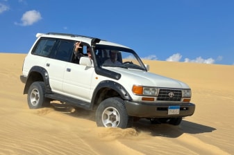 10-Hour Desert Safari from Cairo to Wadi El Rayan with BBQ Lunch