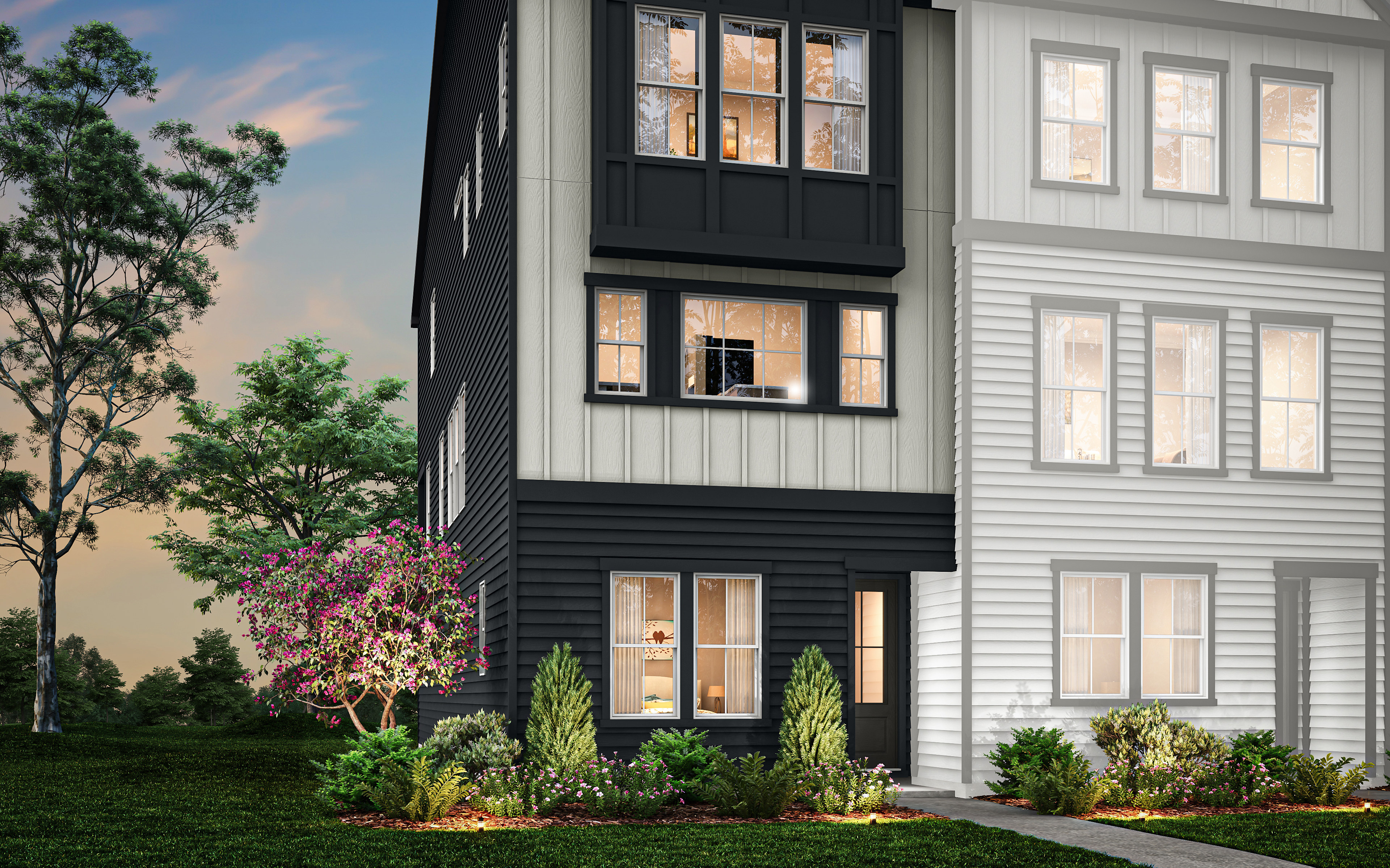 A multi-story residential building with a modern, black and white exterior design, surrounded by lush greenery and a vibrant sunset sky in the background.