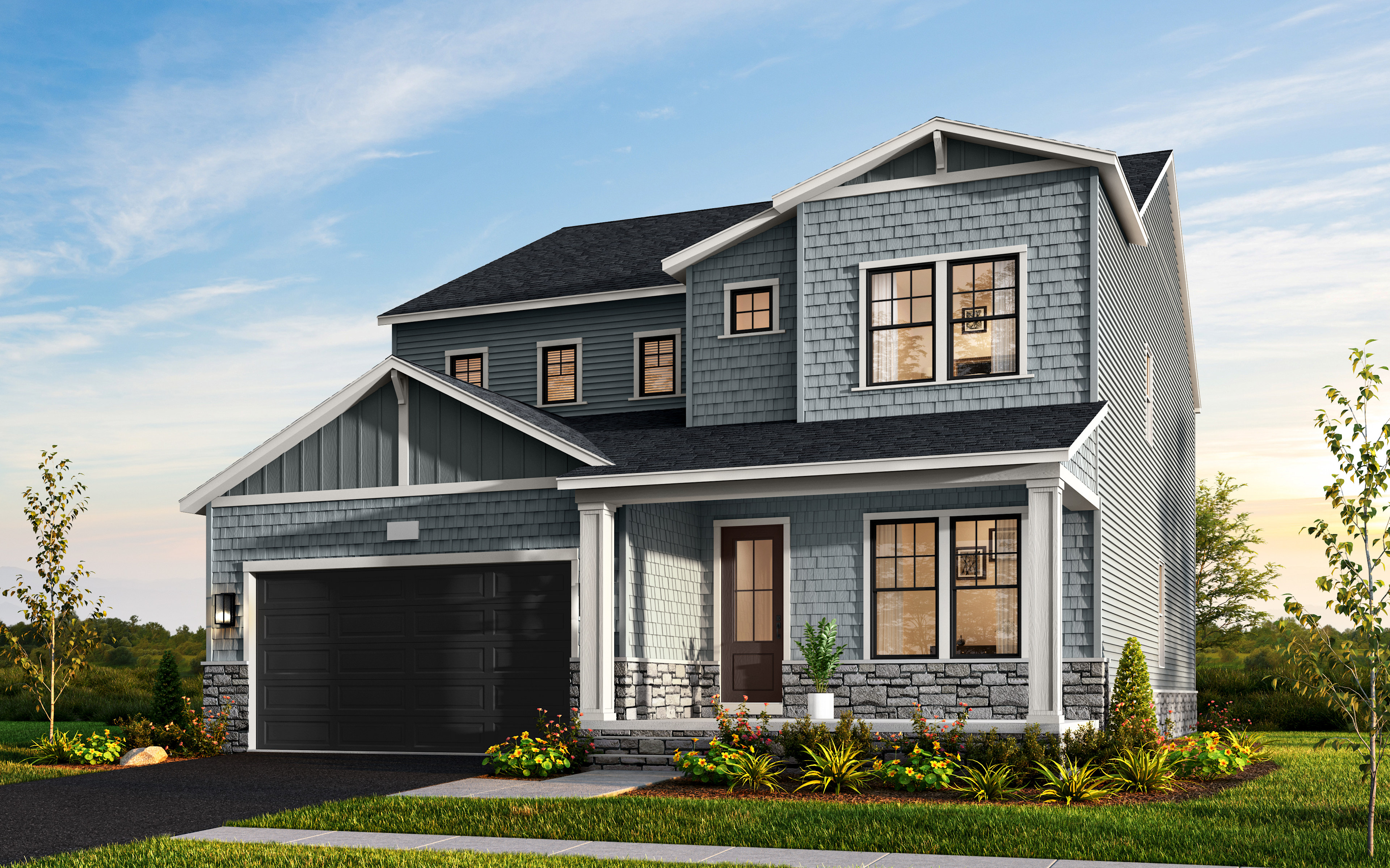 A two-story gray house with a garage, surrounded by a well-manicured lawn and landscaping, stands against a backdrop of a blue sky with wispy clouds.