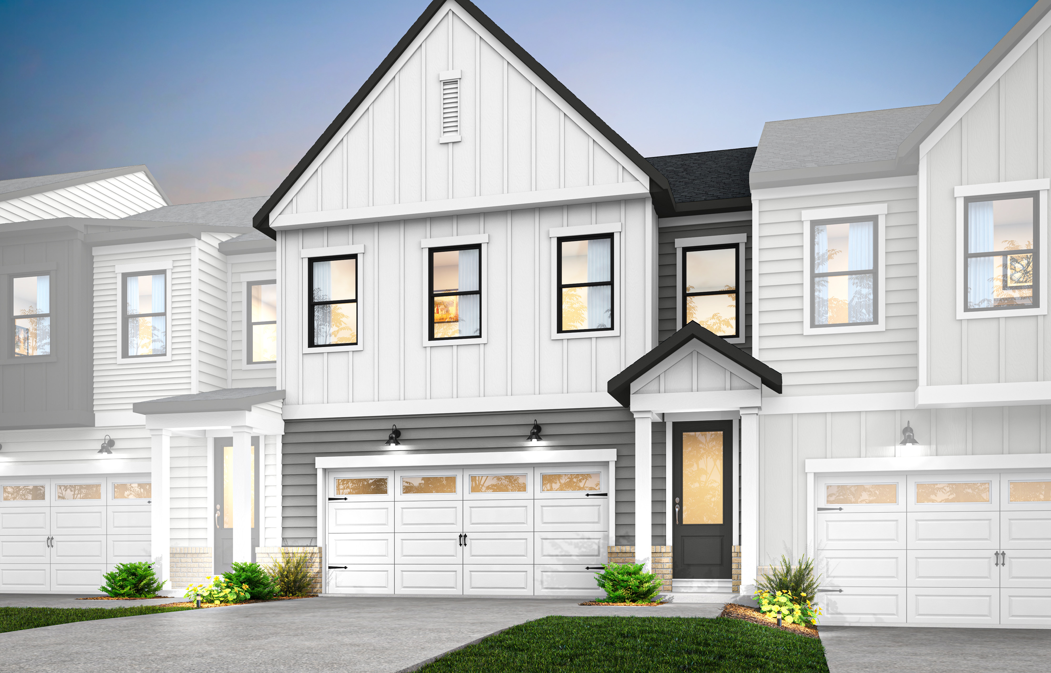 A modern, two-story townhouse with a white exterior, black trim, and a prominent gable roof stands in the foreground, surrounded by a well-manicured lawn and landscaping.