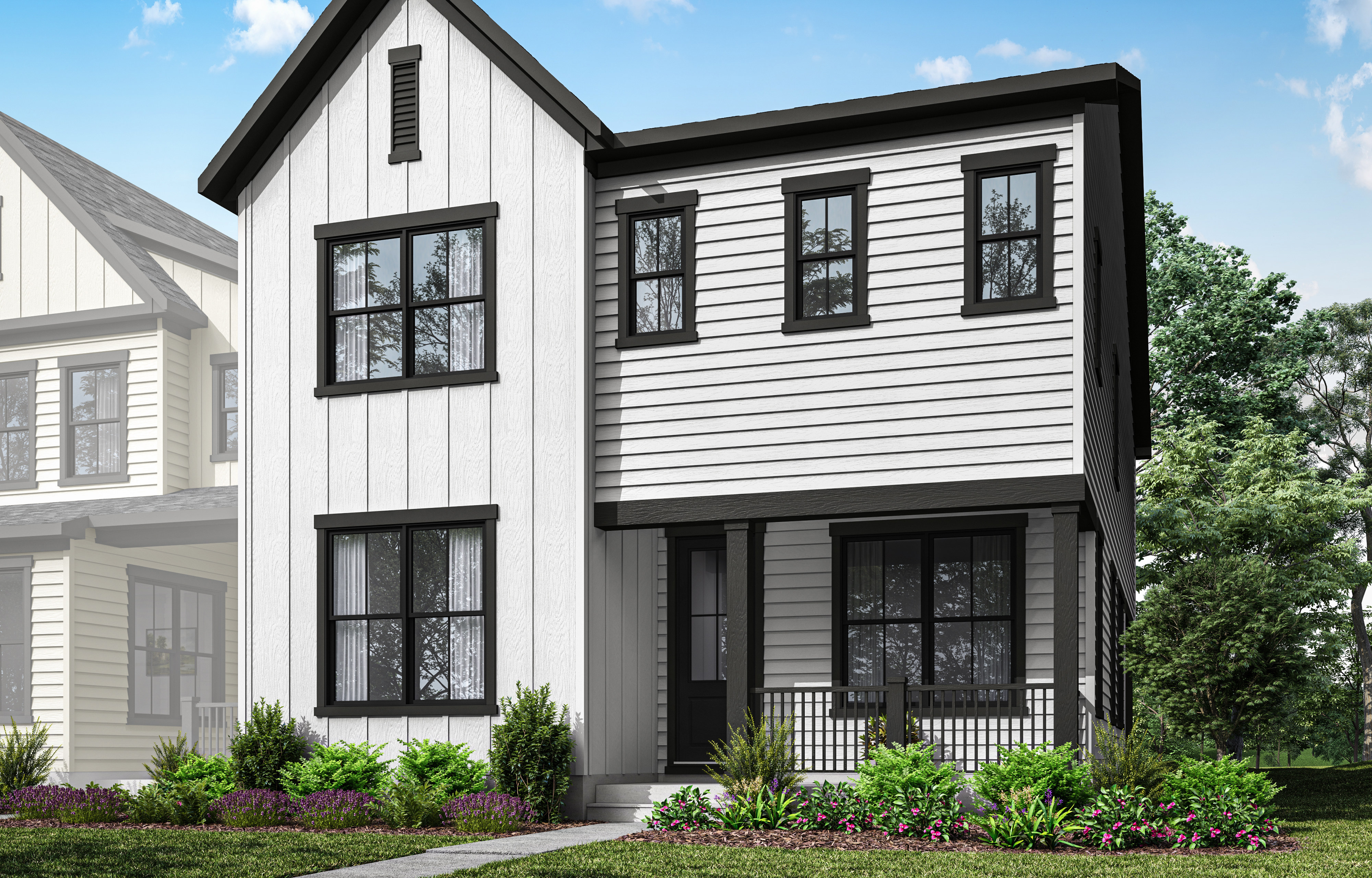 A two-story modern farmhouse-style home with white siding, black trim, and a gabled roof, surrounded by lush greenery and a clear blue sky.