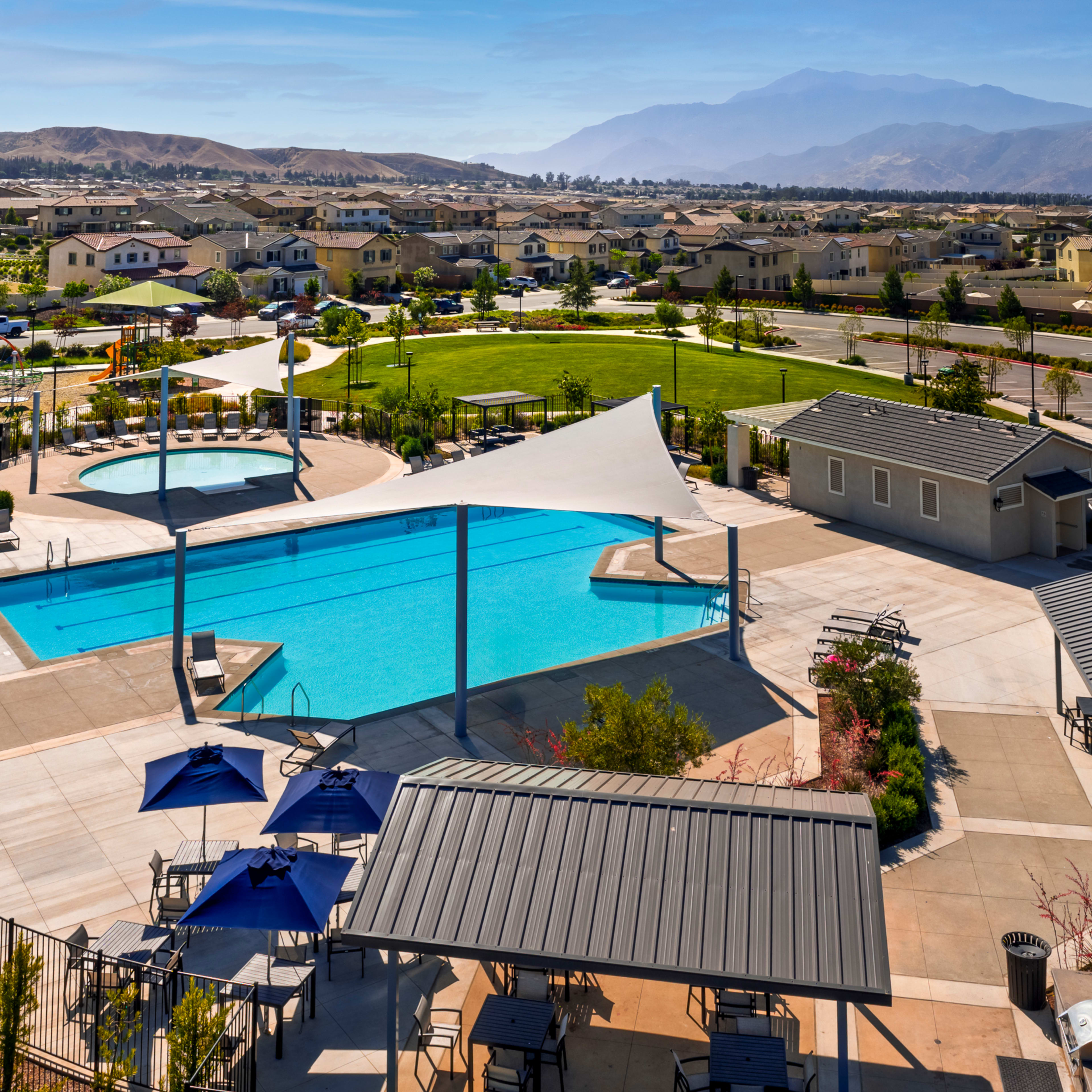 Sparkling pools, playgrounds, and welcoming spaces come together to create a true sense of community.