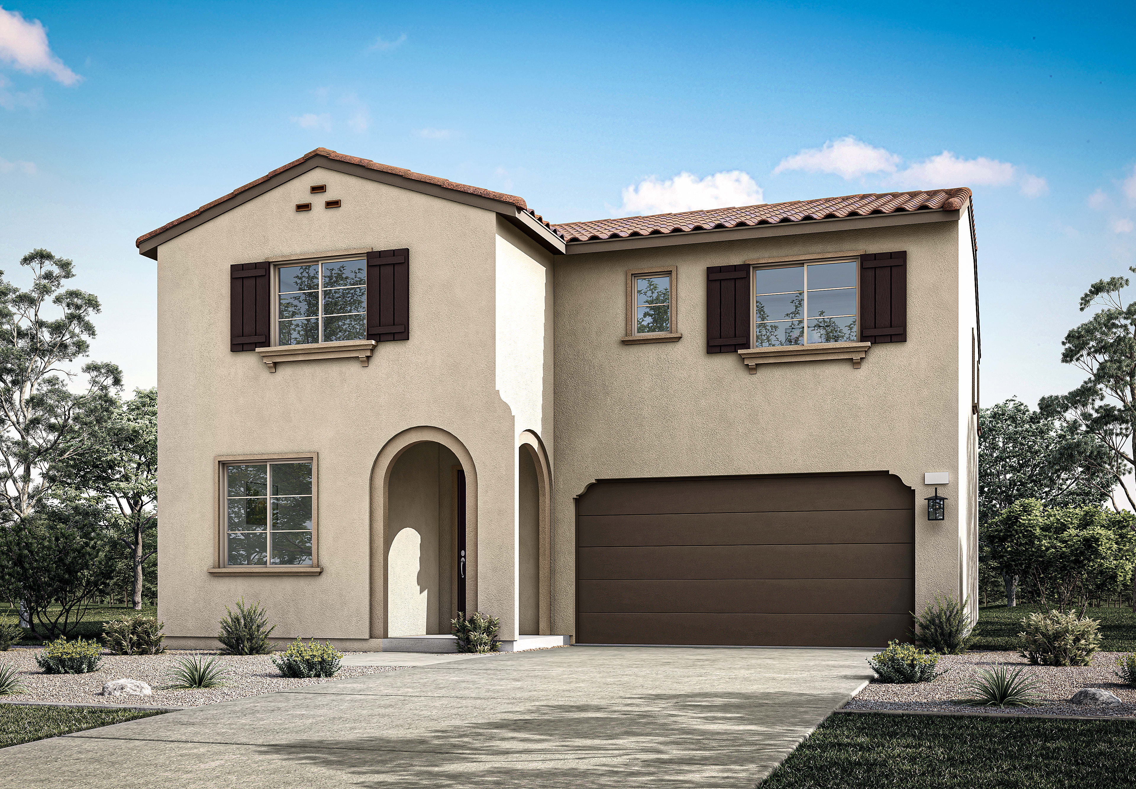 A two-story stucco house with a tiled roof, a garage door, and a paved driveway, set against a backdrop of lush greenery and a clear blue sky.