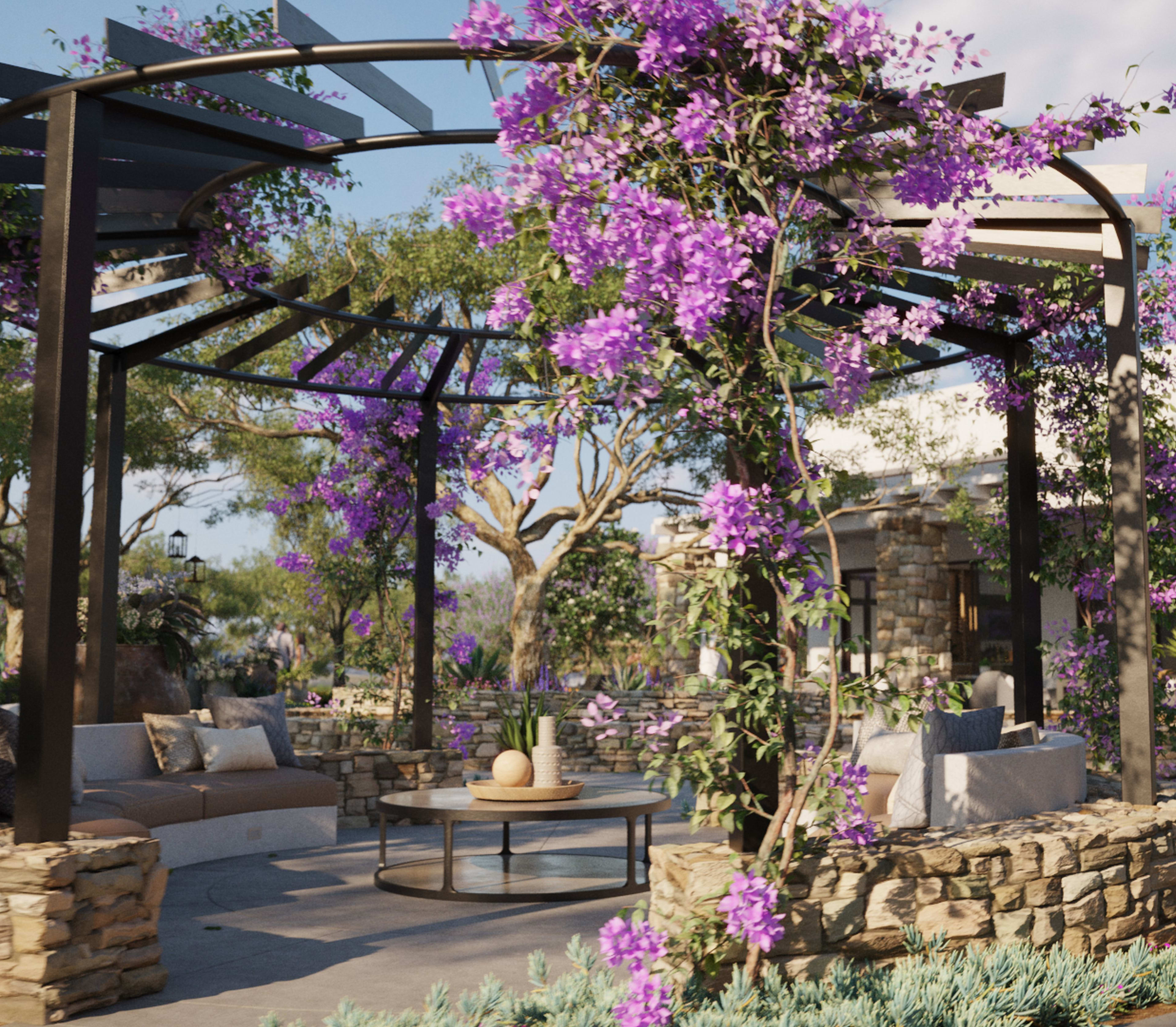 A lush, outdoor seating area with a pergola covered in vibrant purple flowers, surrounded by stone walls and greenery, creating a serene and inviting atmosphere.