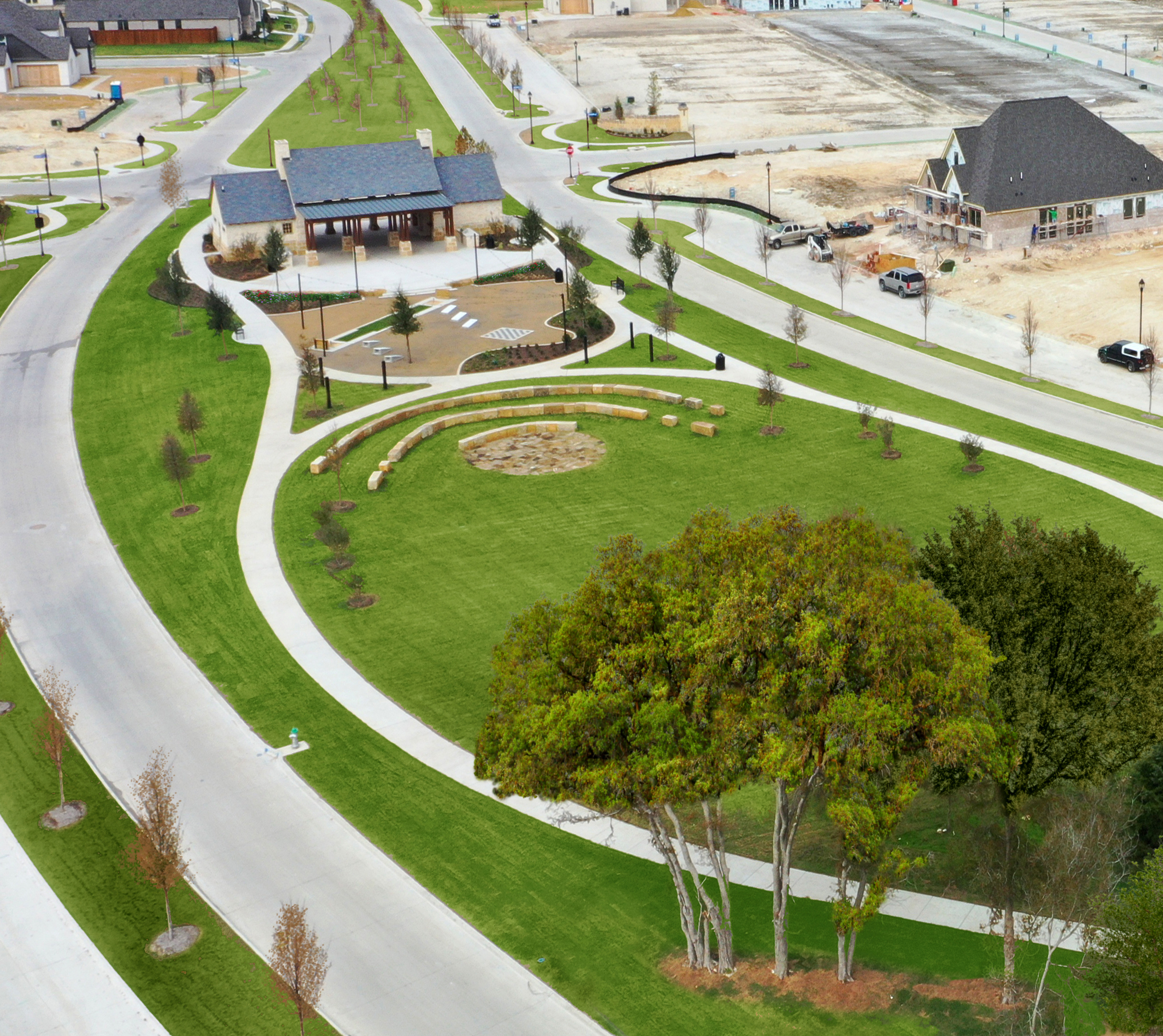 A well-designed residential community with neatly landscaped gardens, winding paths, and a mix of modern and traditional-style buildings in the background.